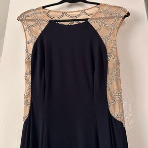 Elegant Black and Cream Dress with Embellishments
